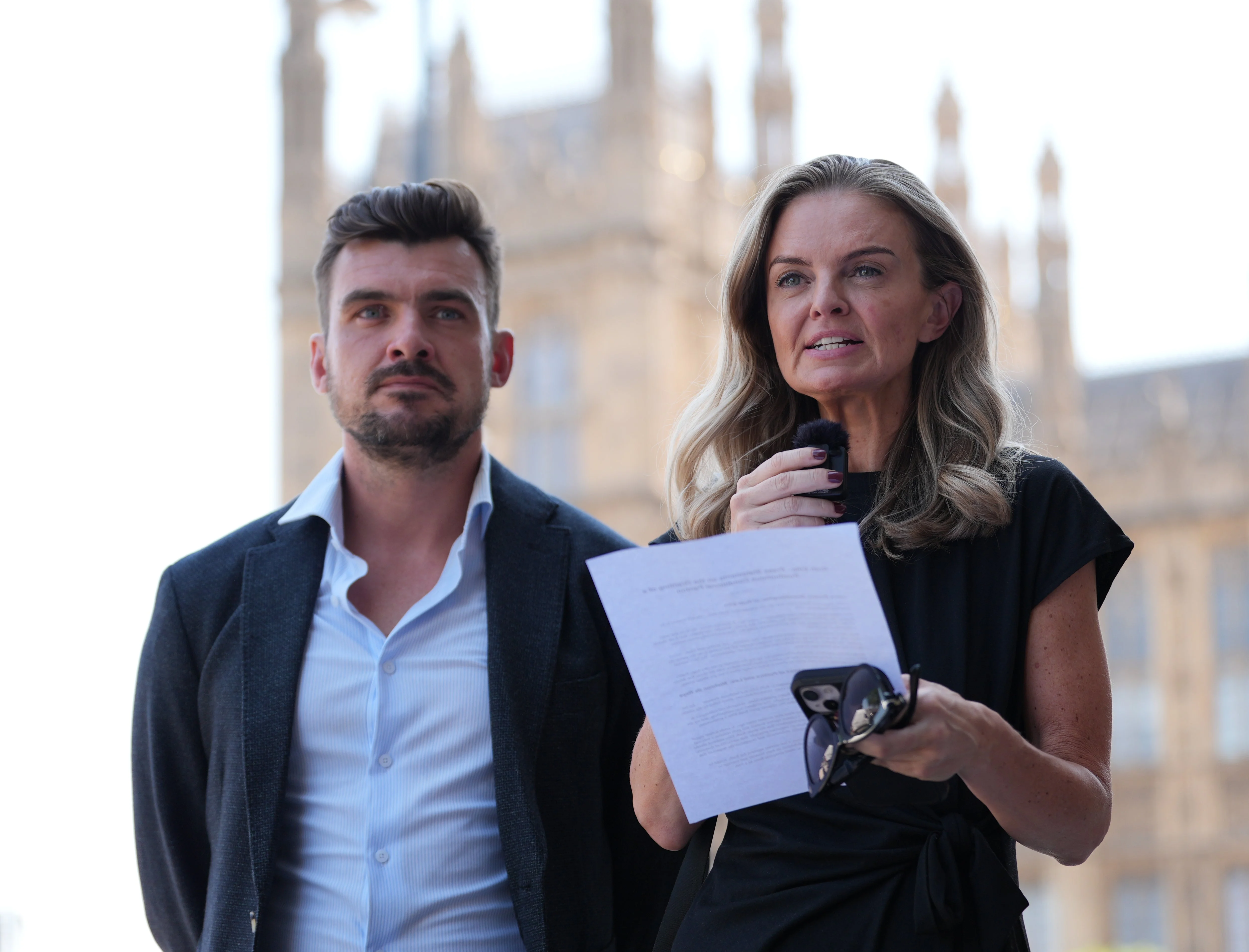 Laura Enston (centre), and Stephen Beard, the grandchildren of Ruth Ellis, making a statement to media outside the Houses of Parliament