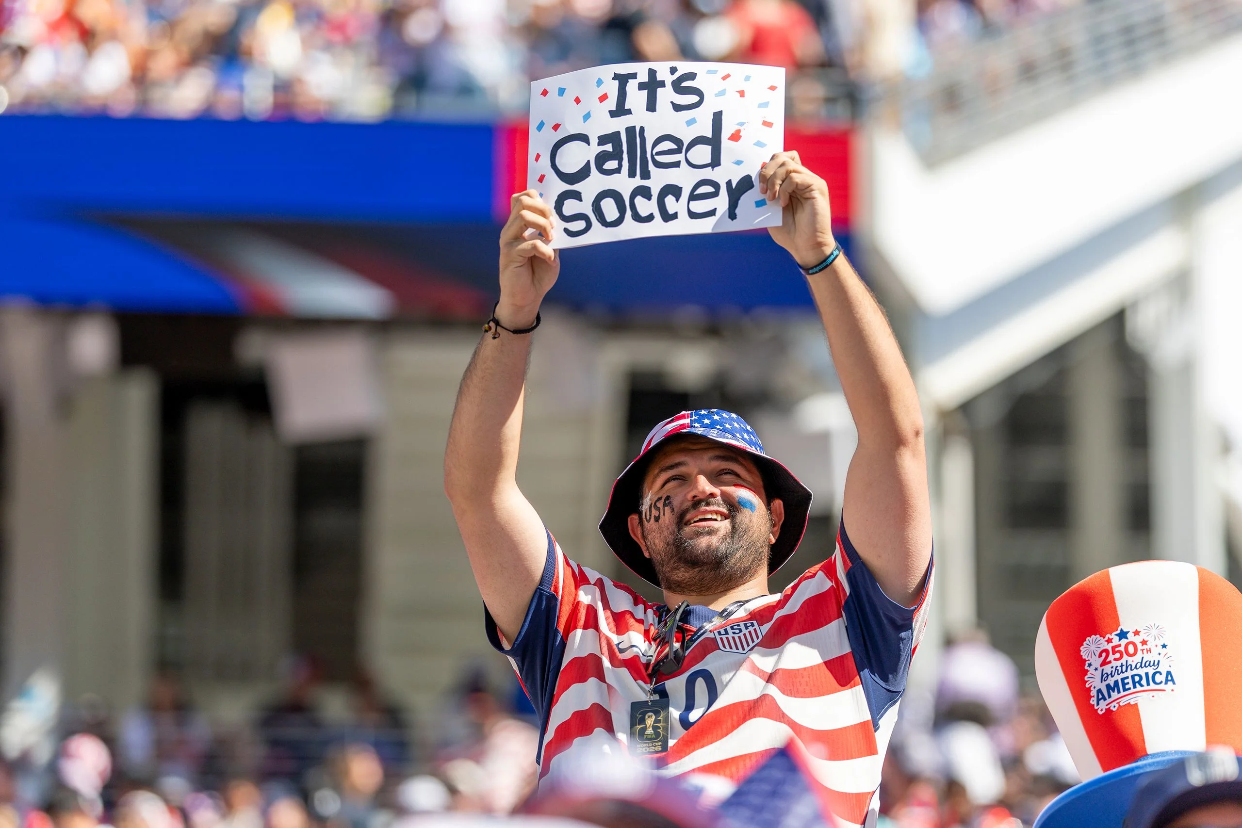 A soccer fan in a stadium.