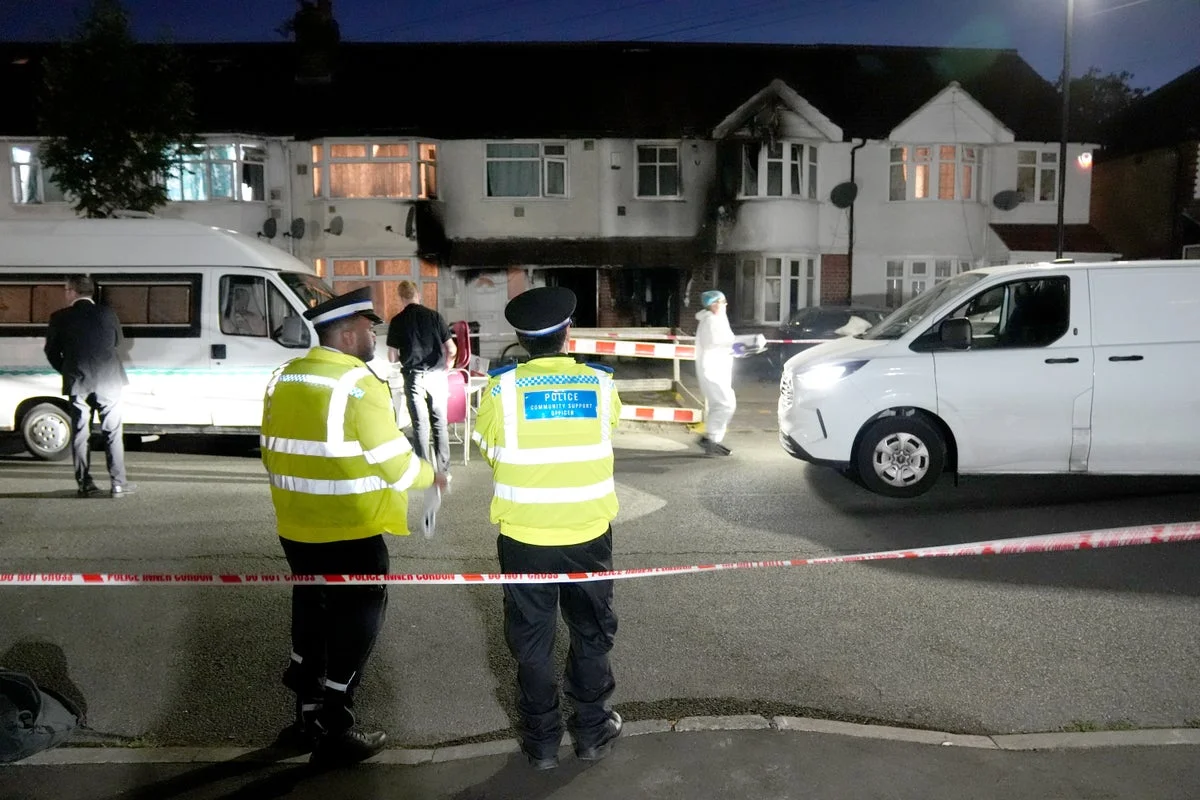 Murder investigation launched after woman dies and eight others injured in house fire