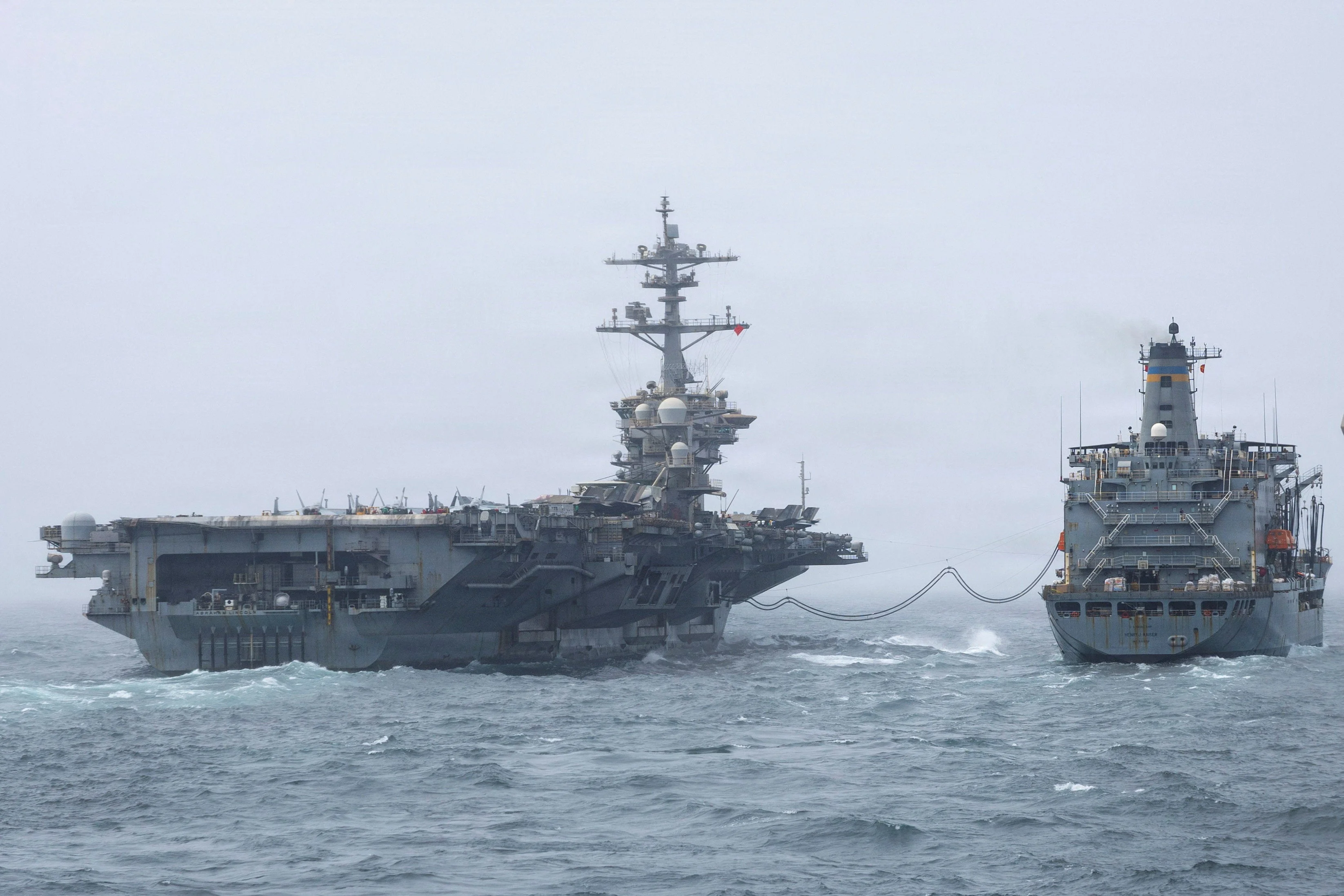 The Lincoln receives fuel from the oiler USNS Henry J. Kaiser on August 17