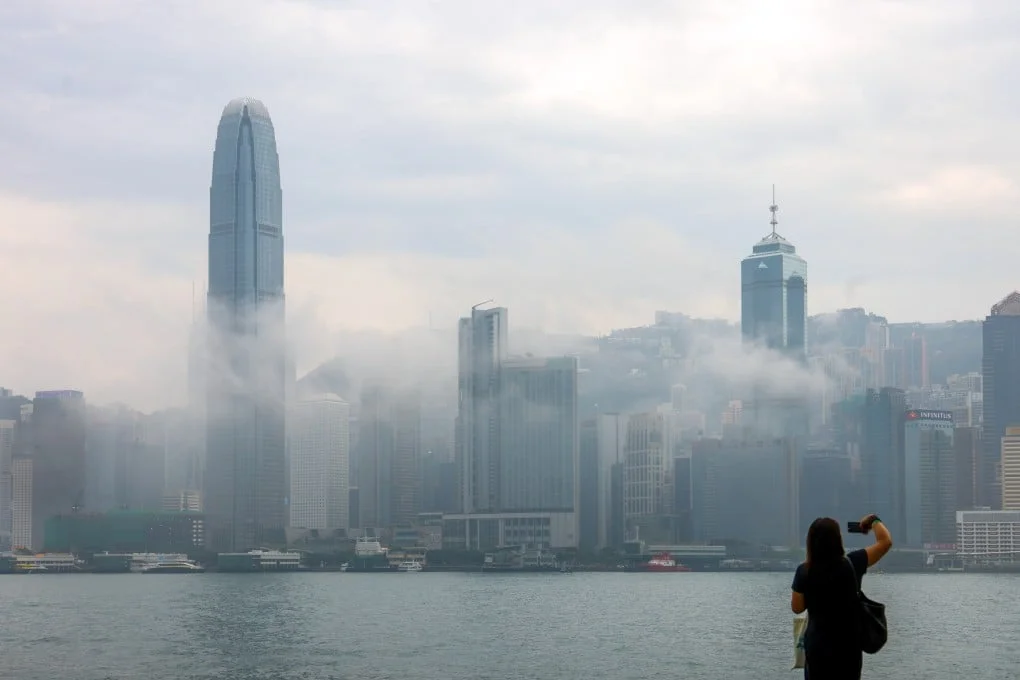 A thick, humid haze settles over Victoria Harbour in April. Hong Kong has set a plan to achieve carbon neutrality before 2050 alongside an overall energy reduction goal. Photo: Dickson Lee