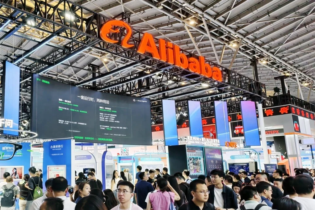 Tourists visit the Alibaba Group booth at the 2026 World Artificial Intelligence Conference in Shanghai, China, on July 17. Photo: CFOTO/Future Publishing via Getty Images