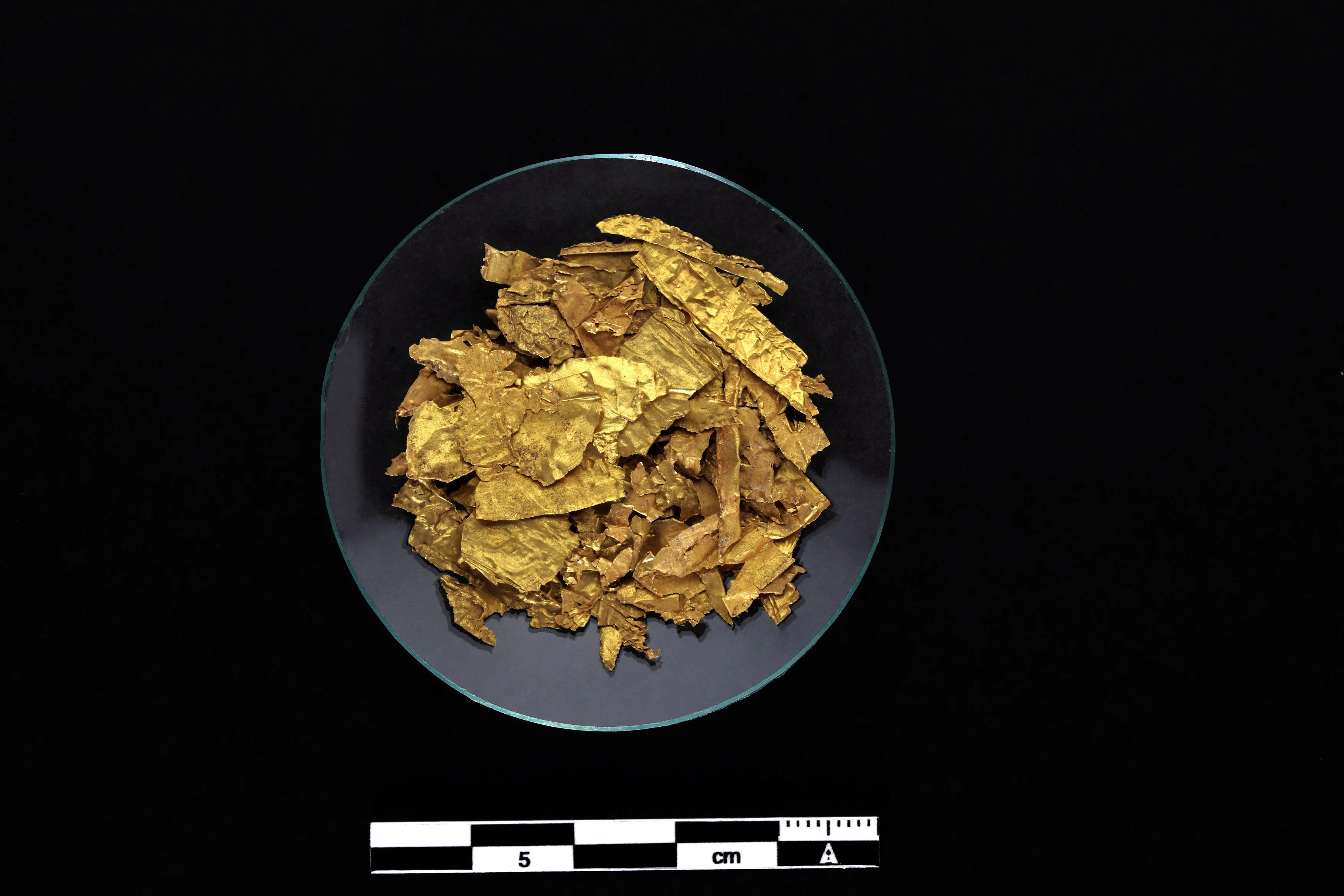 Lead and gold are different elements, with three protons’ difference between them