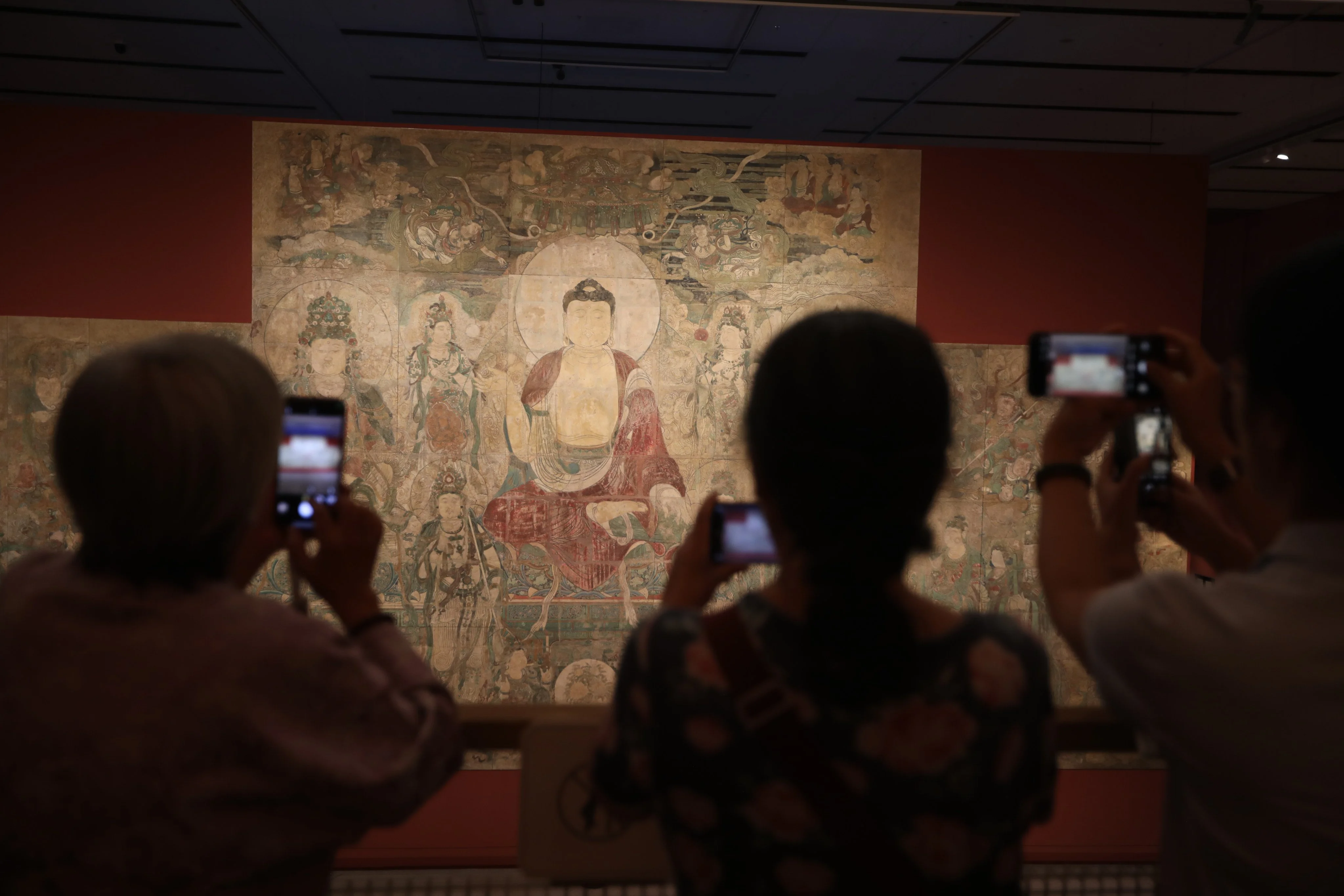 A life-size replica of the Yuan dynasty mural "Medicine Buddha" is displayed at the China National Arts and Crafts Museum in Beijing on September 26. Photo: Simon Song