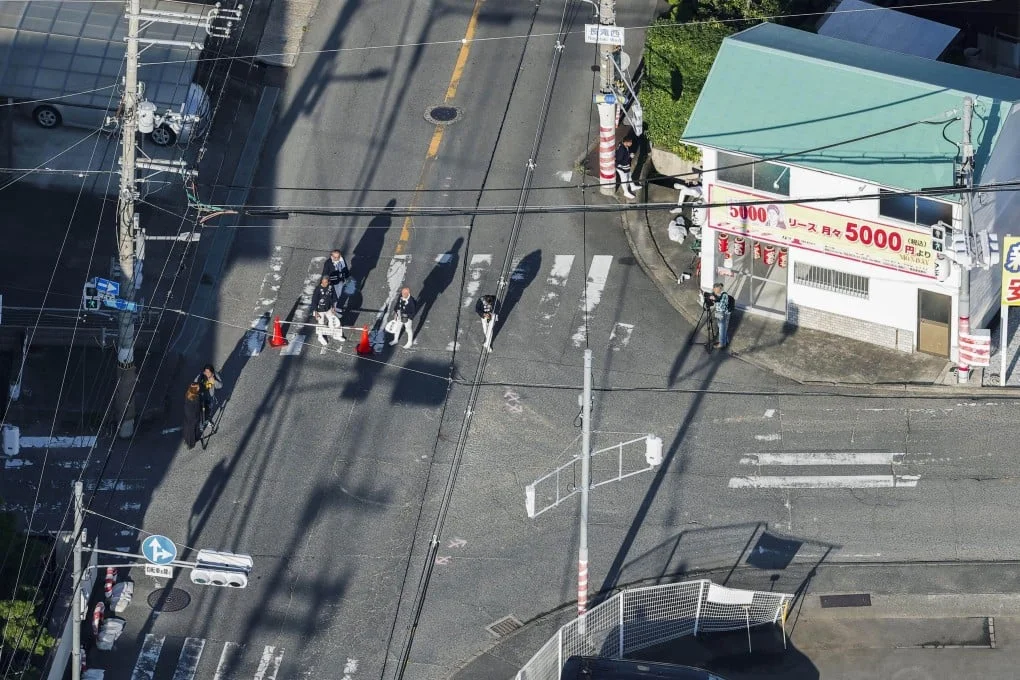 A photo taken from a Kyodo News helicopter on Saturday shows a site in Izumisano, Osaka Prefecture where a festival float overturned. Photo: Kyodo