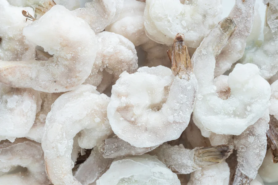 An 18-year-old Bronx man and a juvenile were arrested for allegedly unloading frozen shrimp, salmon and other seafood from a refrigerated tractor-trailer into a 26-foot box truck in North Arlington, New Jersey