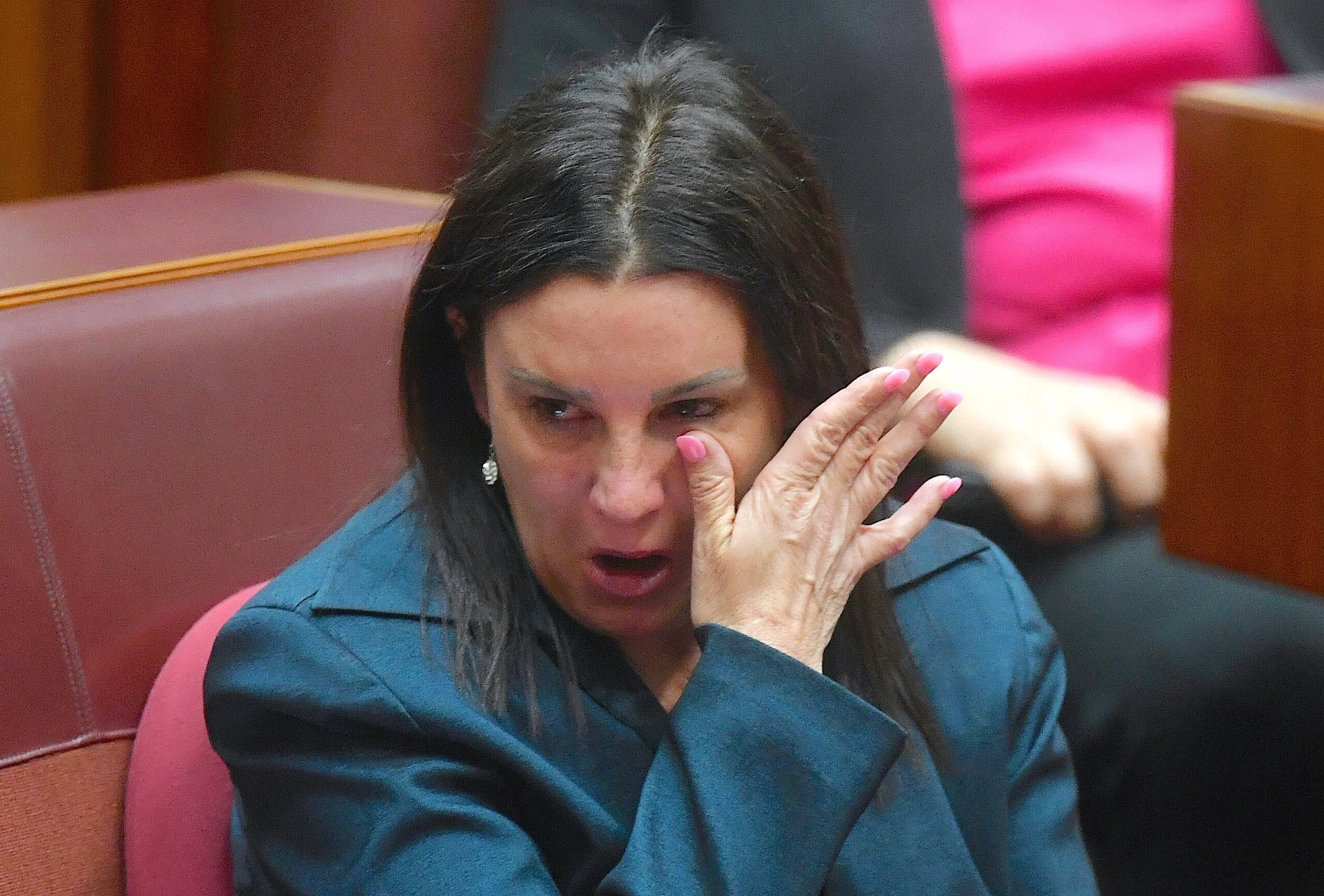 Australian Senator Jacqui Lambie, reacts after delivering a statement regarding her resignation in the Senate chamber at Parliament House in Canberra, Australia, November 14, 2017. AAP/Lukas Coch/via REUTERS ATTENTION EDITORS - THIS IMAGE WAS PROVIDED BY A THIRD PARTY. NO RESALES. NO ARCHIVE. AUSTRALIA OUT. NEW ZEALAND OUT. TPX IMAGES OF THE DAY