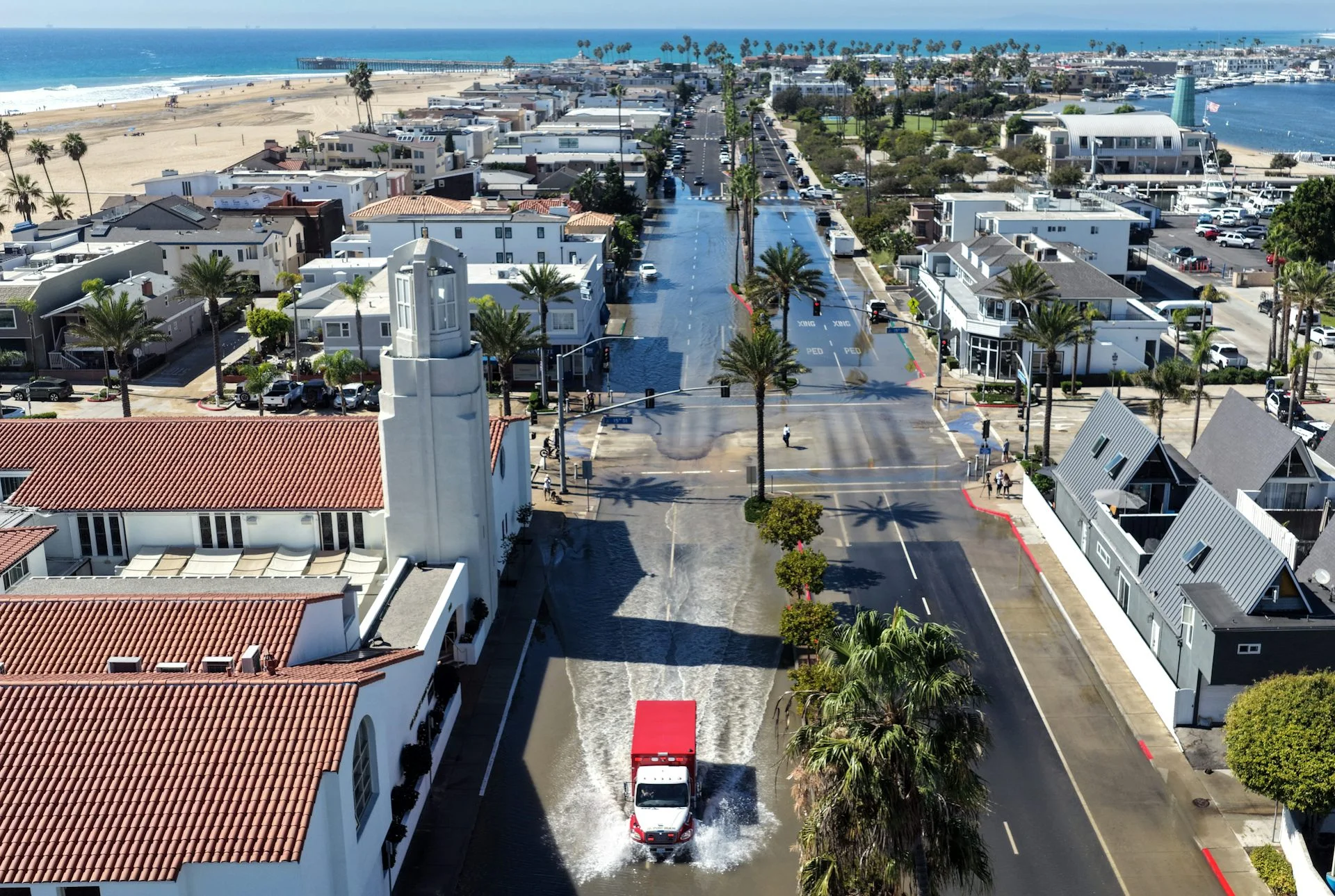 Flooded streets in a coastal town.