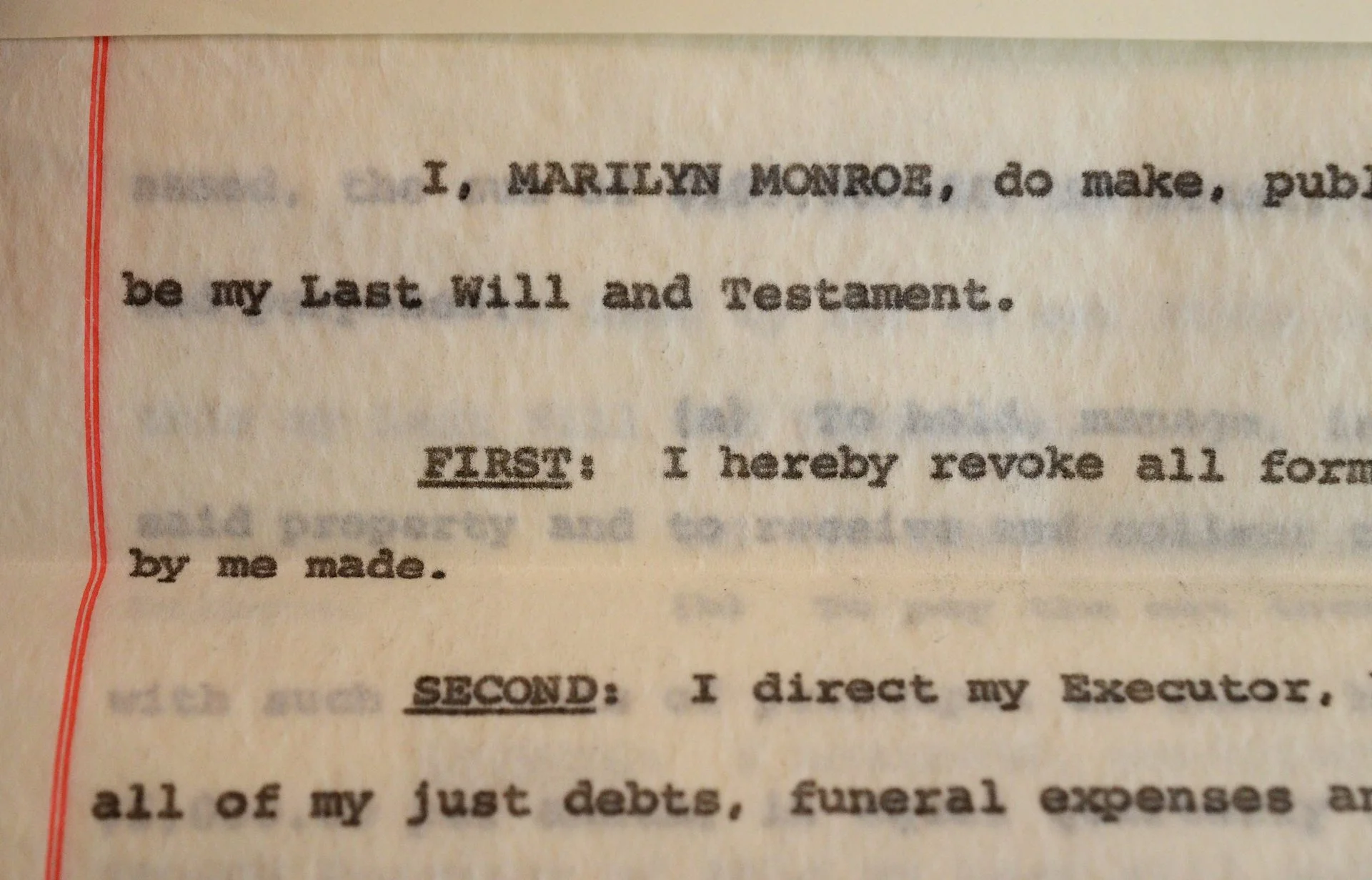 An excerpt from Marilyn Monroe's will is seen up close.